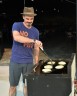 David Mark, Mayor of Nokomis, flipping pancakes